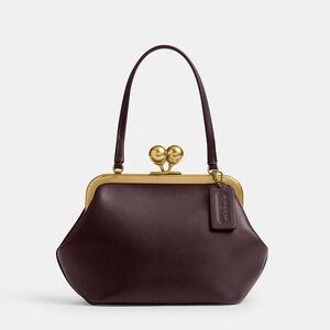 Coach Kisslock Frame Bag 16 in Brass/Black Currant Glovetanned Leather NWT￼